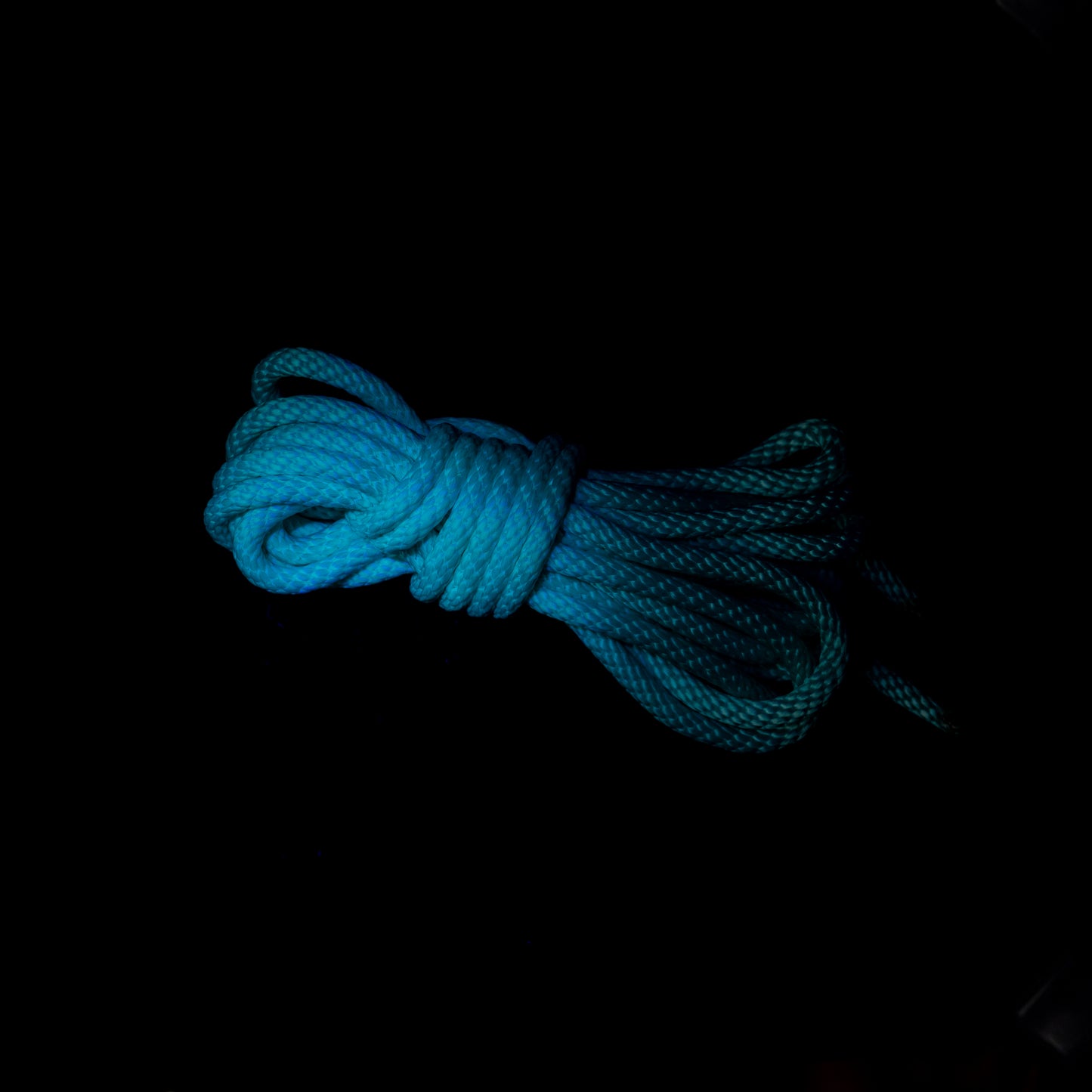 15 ft nylon rope bundle in Mermaid Mint — a luminous seafoam green rope that glows like enchanted ocean light under blacklight.