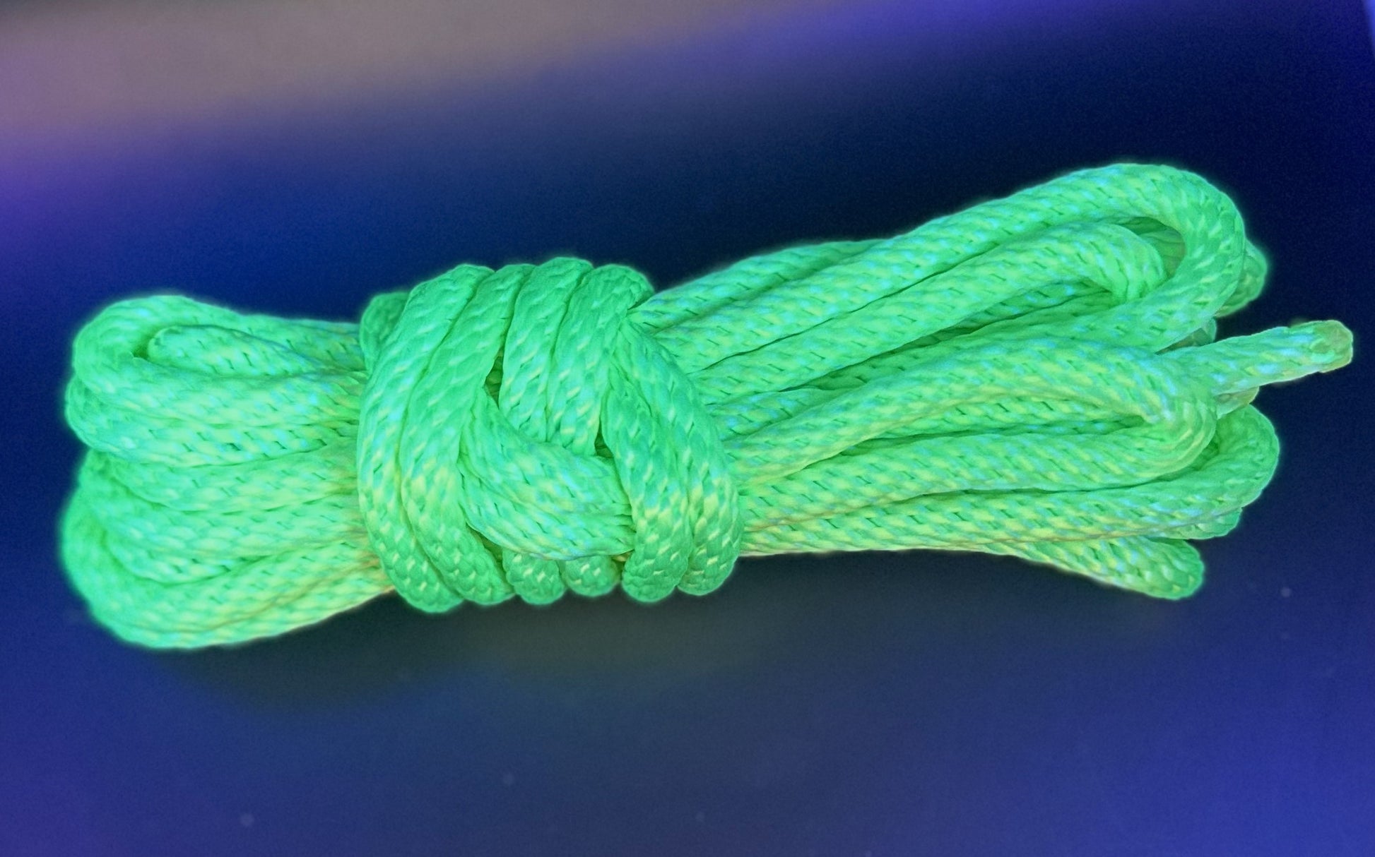 15 ft nylon rope bundle in Screamin' Neon - a light yellow green in day time lighting, but under the black light, this shade screams so loud you can't ignore it.  