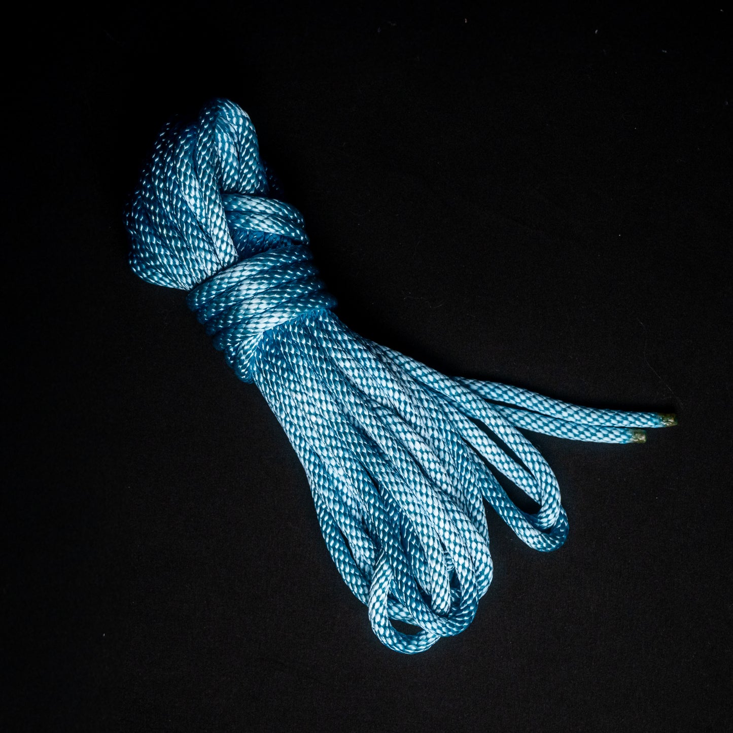 30 ft nylon rope bundle in Frostbight, a neon light blue that hums like frozen lightning under black/UV light. 