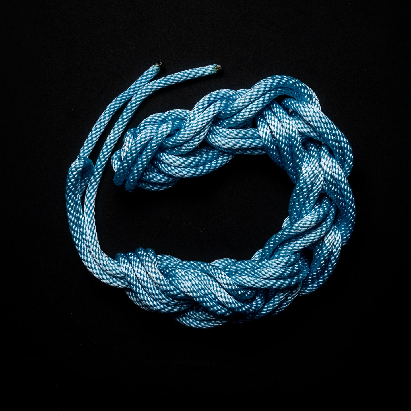 30 ft nylon rope bundle with minor manufacturing imperfections in Frostbight, a neon light blue that hums like frozen lightning.