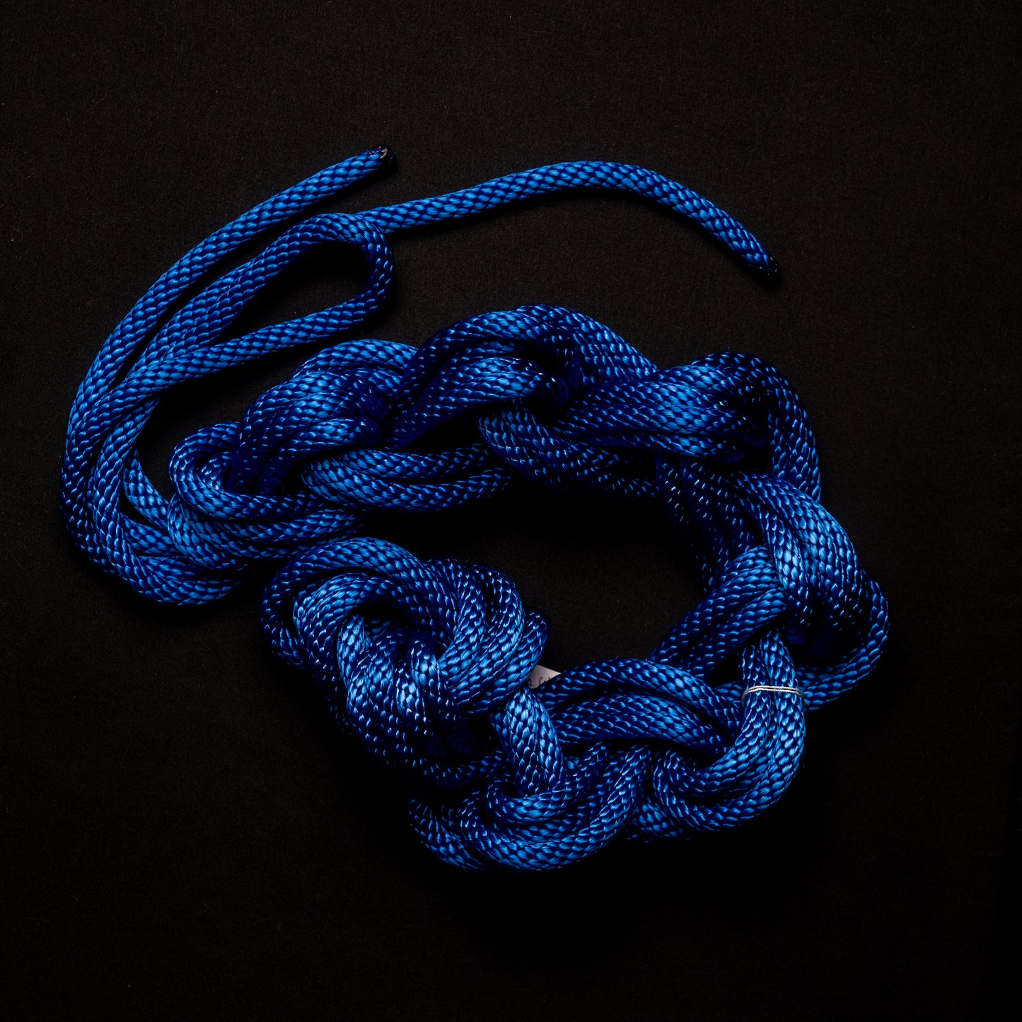 30 ft nylon rope bundle with minor manufacturing imperfections in Neon Whovian Blue — deep royal ultramarine with a glow that blazes galactic under blacklight.