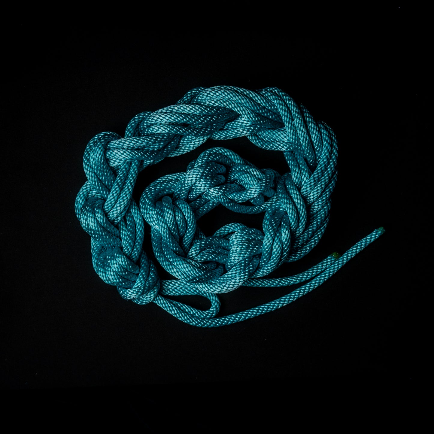 50 ft nylon rope bundle with minor manufacturing imperfections in in AquaKnot, a neon water blue glowing with vibrant aquatic shimmer.