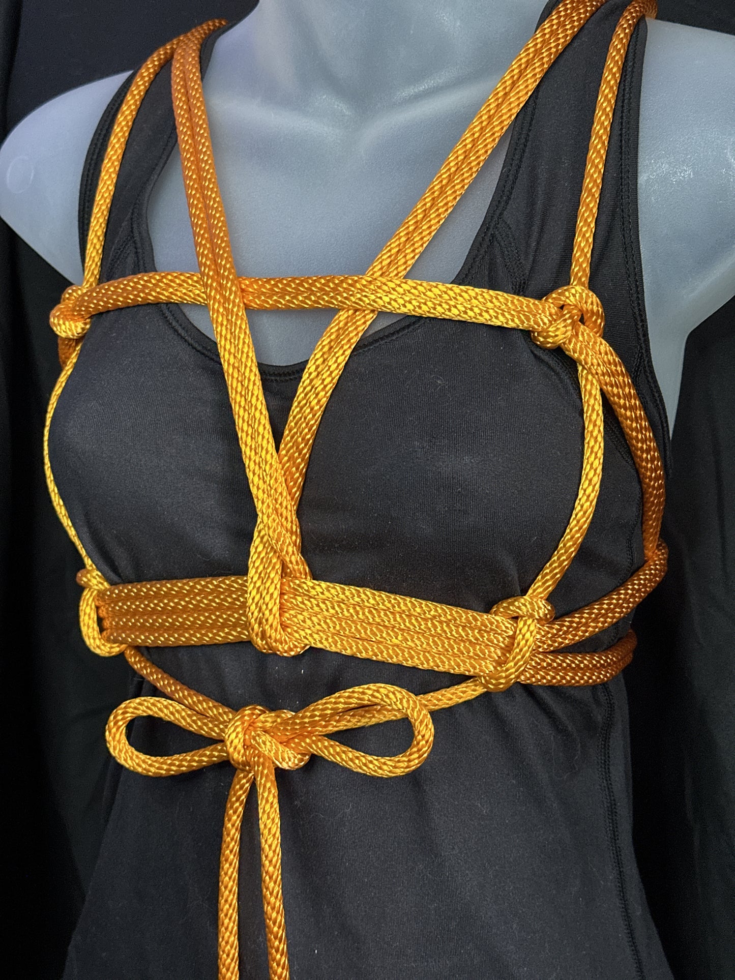 mannequin decorated in tangerine tease nylon rope
